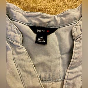 Intro. light chambray button-up top. Sized medium.